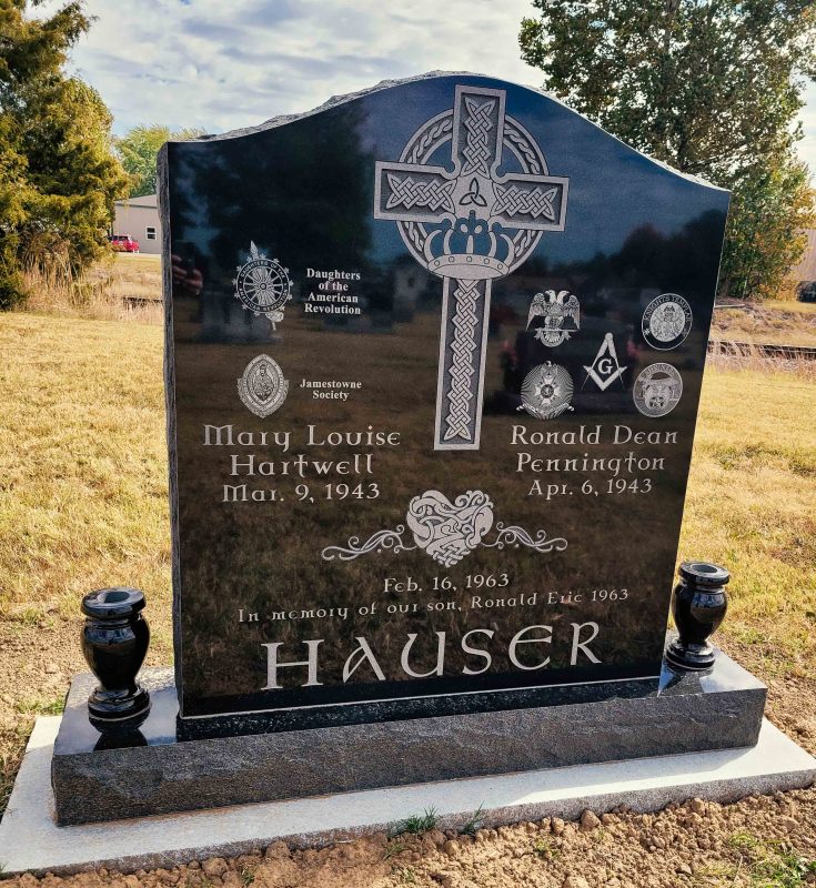 Hauser Monument with Organization Logos and Black Vases